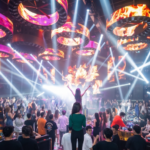 Crowded luxury nightclub in Bangkok with LED lights, EDM music, dancers, laser show, and vibrant nightlife atmosphere in Thailand