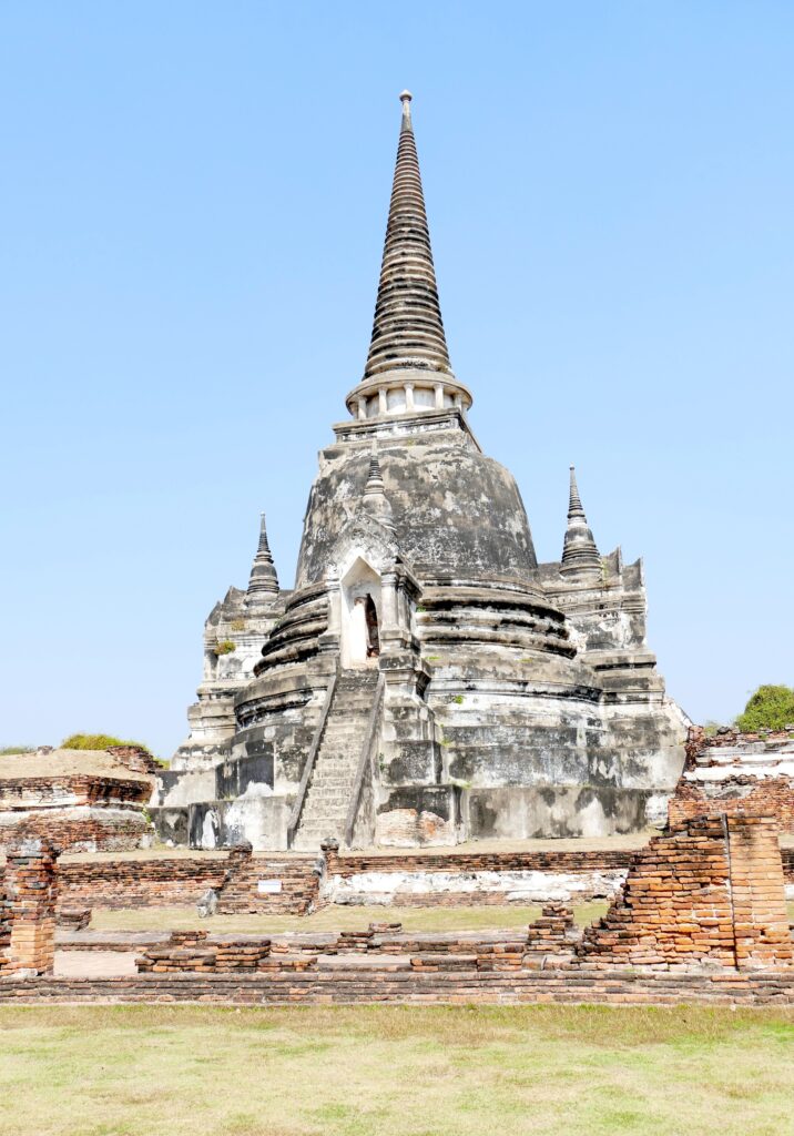 Ancient bell-shaped Buddhist chedi at Wat Phra Si Sanphet in Ayutthaya Historical Park, a popular Bangkok day trip destination.